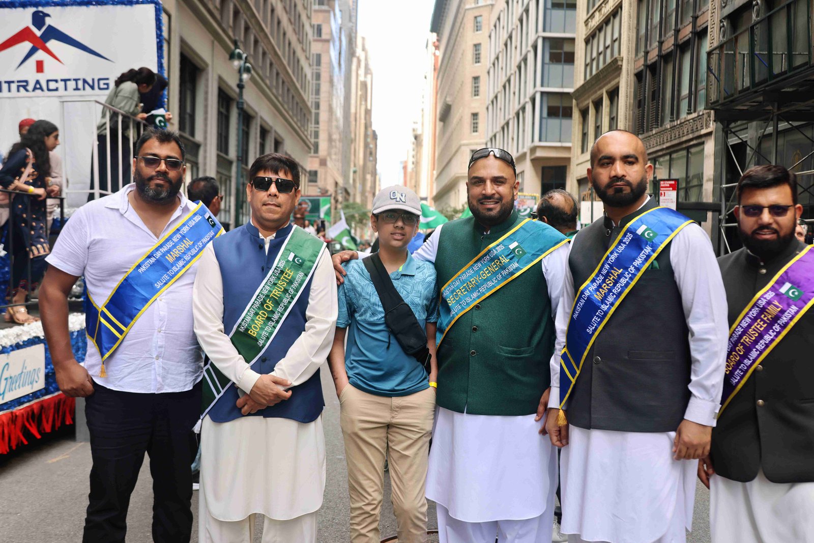 Colorful parade float and participants celebrating Pakistani culture
